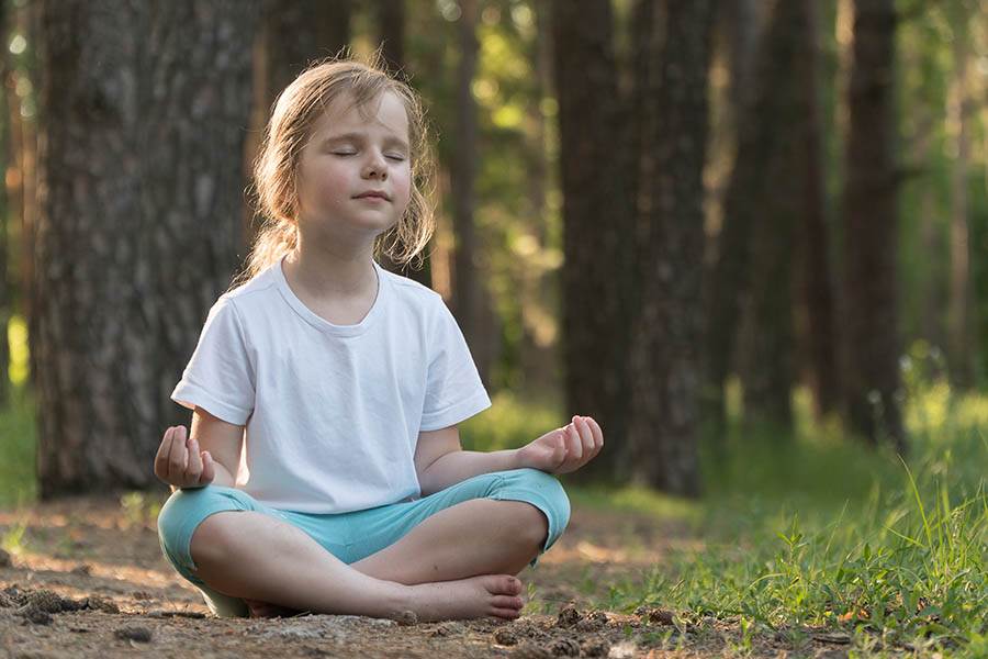 Meditating child