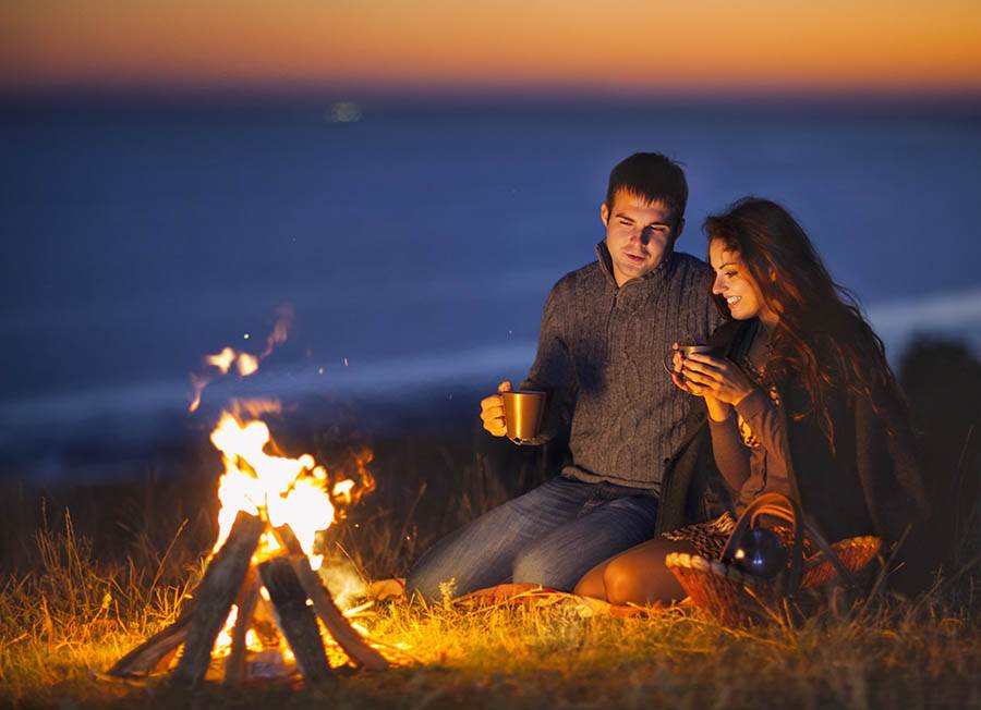 Couple near a fire